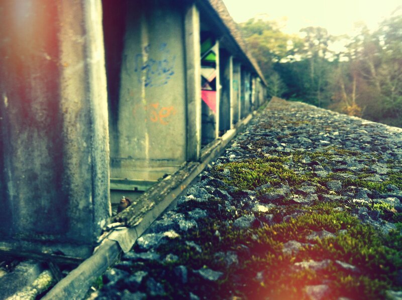 abandoned train car on a bridge