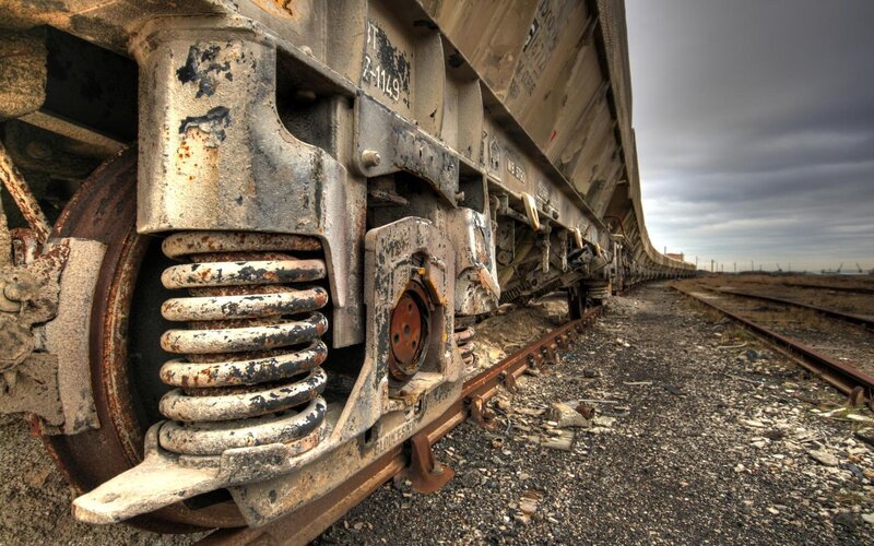 abandoned train car on tracks