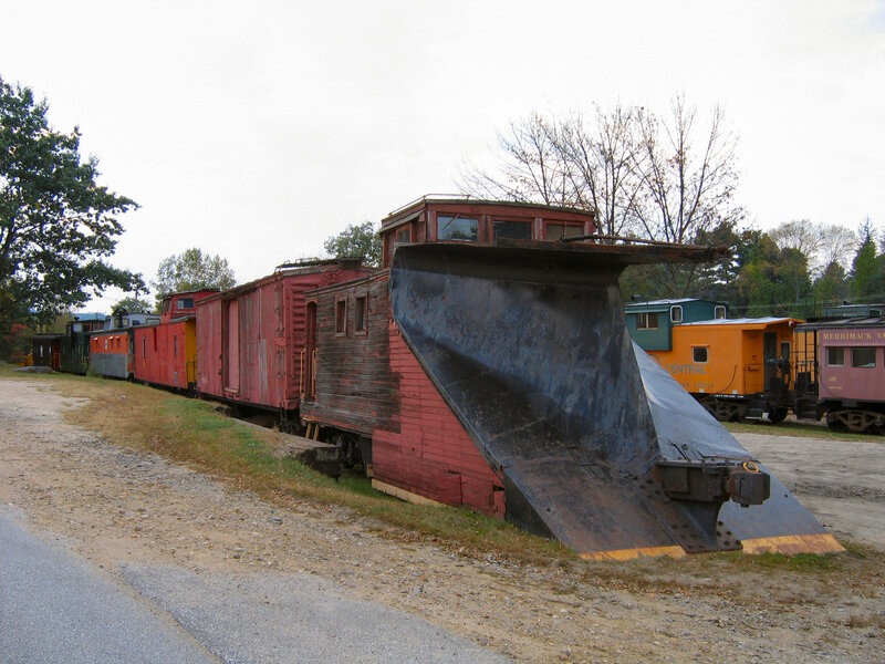 Abandoned train cars at a rail yard