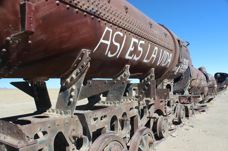 Abandoned Train Cars — Brown, Desolate, Afternoon