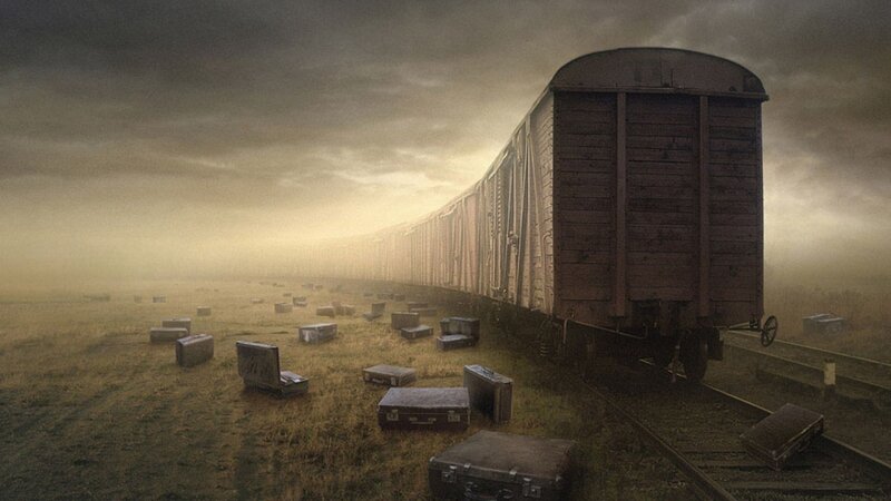 Abandoned train in a foggy field