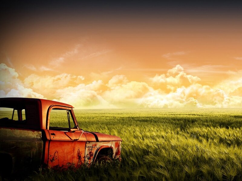 Abandoned truck in a field