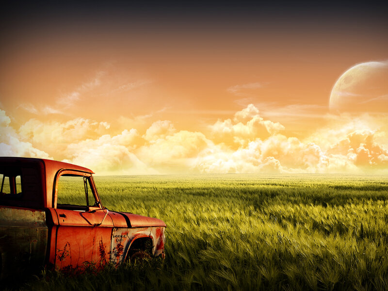 Abandoned truck in a field