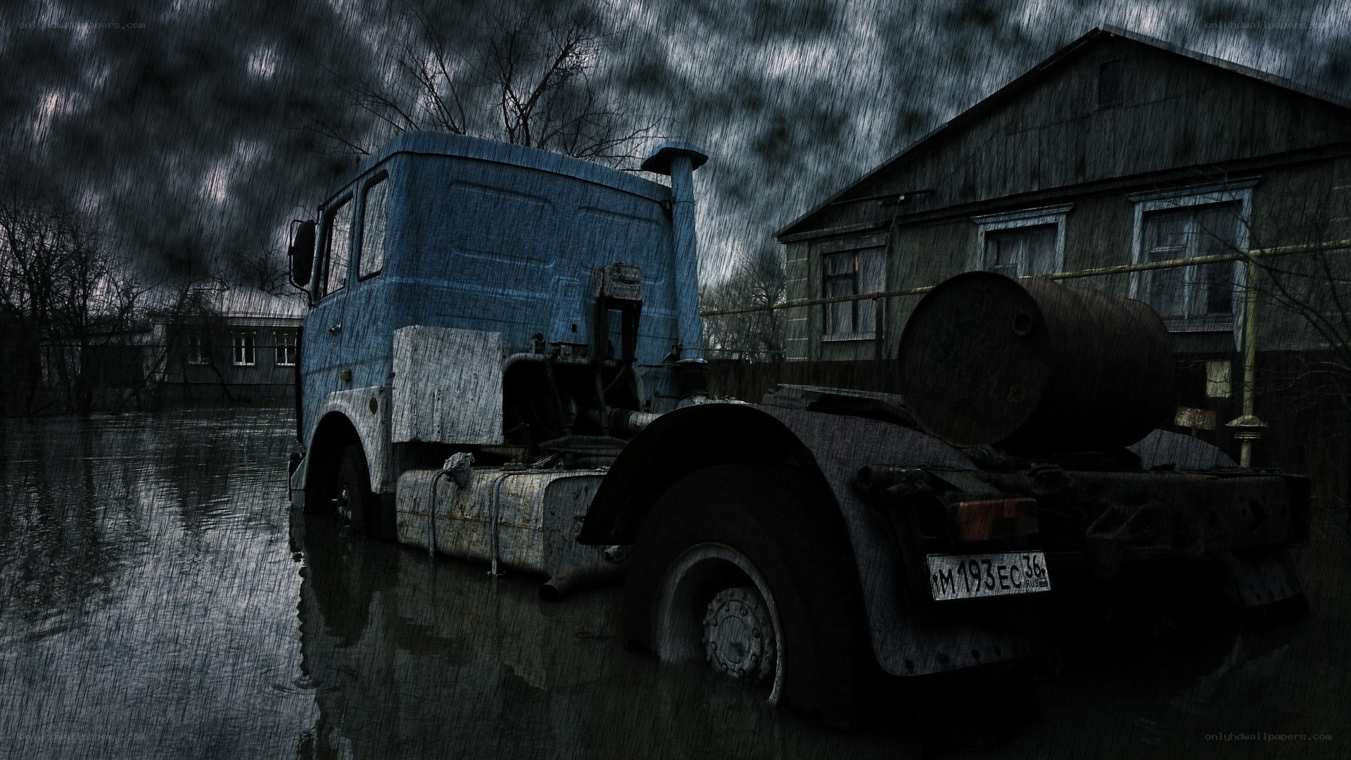 abandoned truck in flooded area