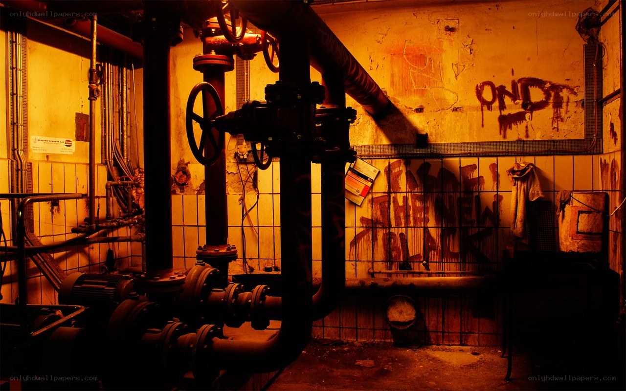 abandoned utility room with graffiti