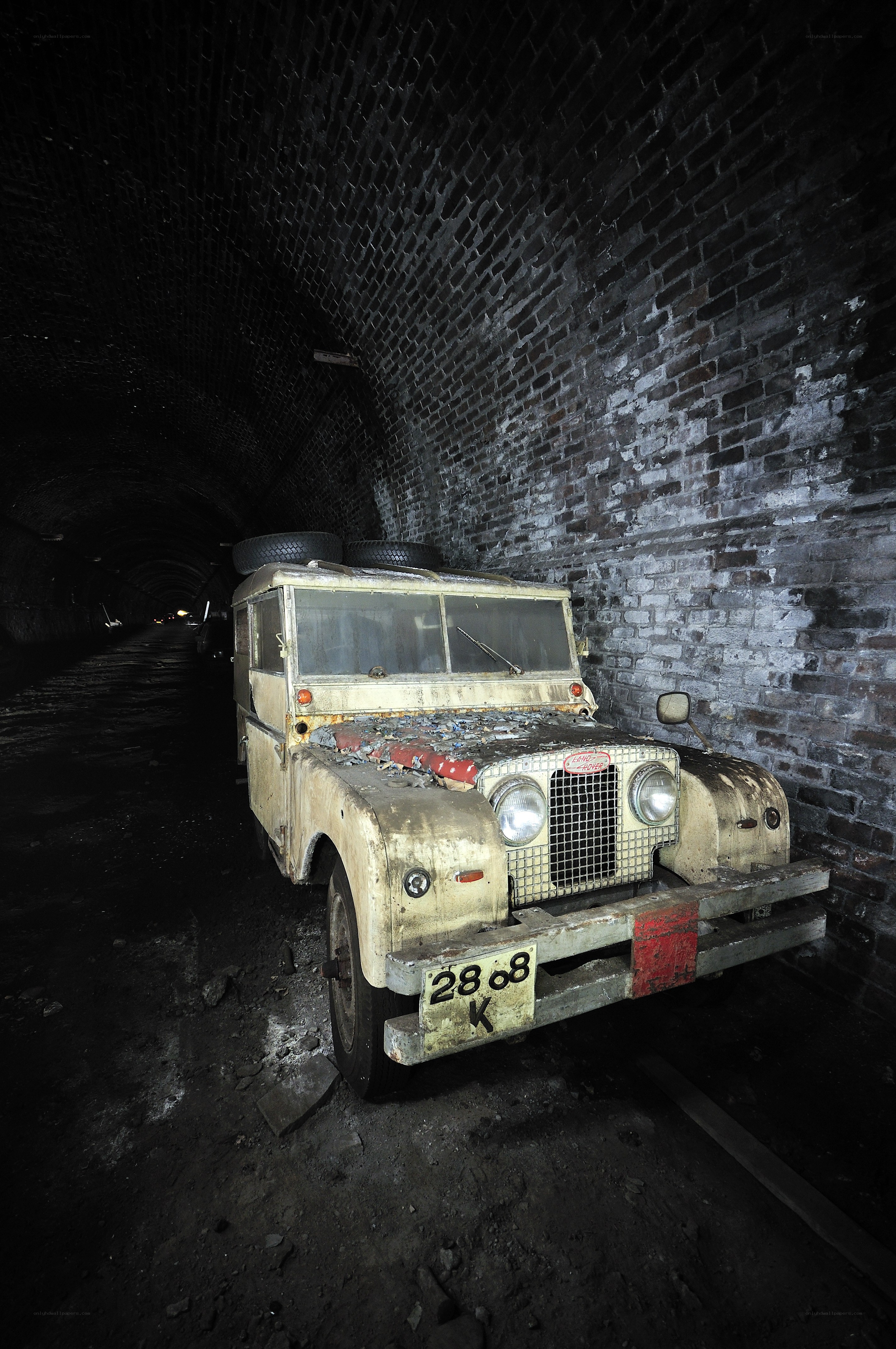 Abandoned vehicle in tunnel