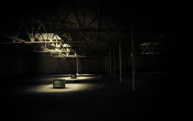 abandoned warehouse with televisions