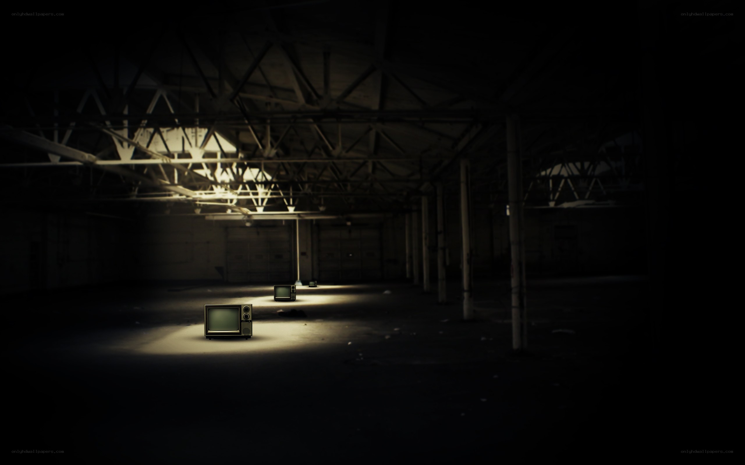 abandoned warehouse with televisions