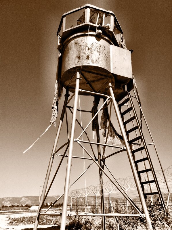Abandoned watchtower in sepia
