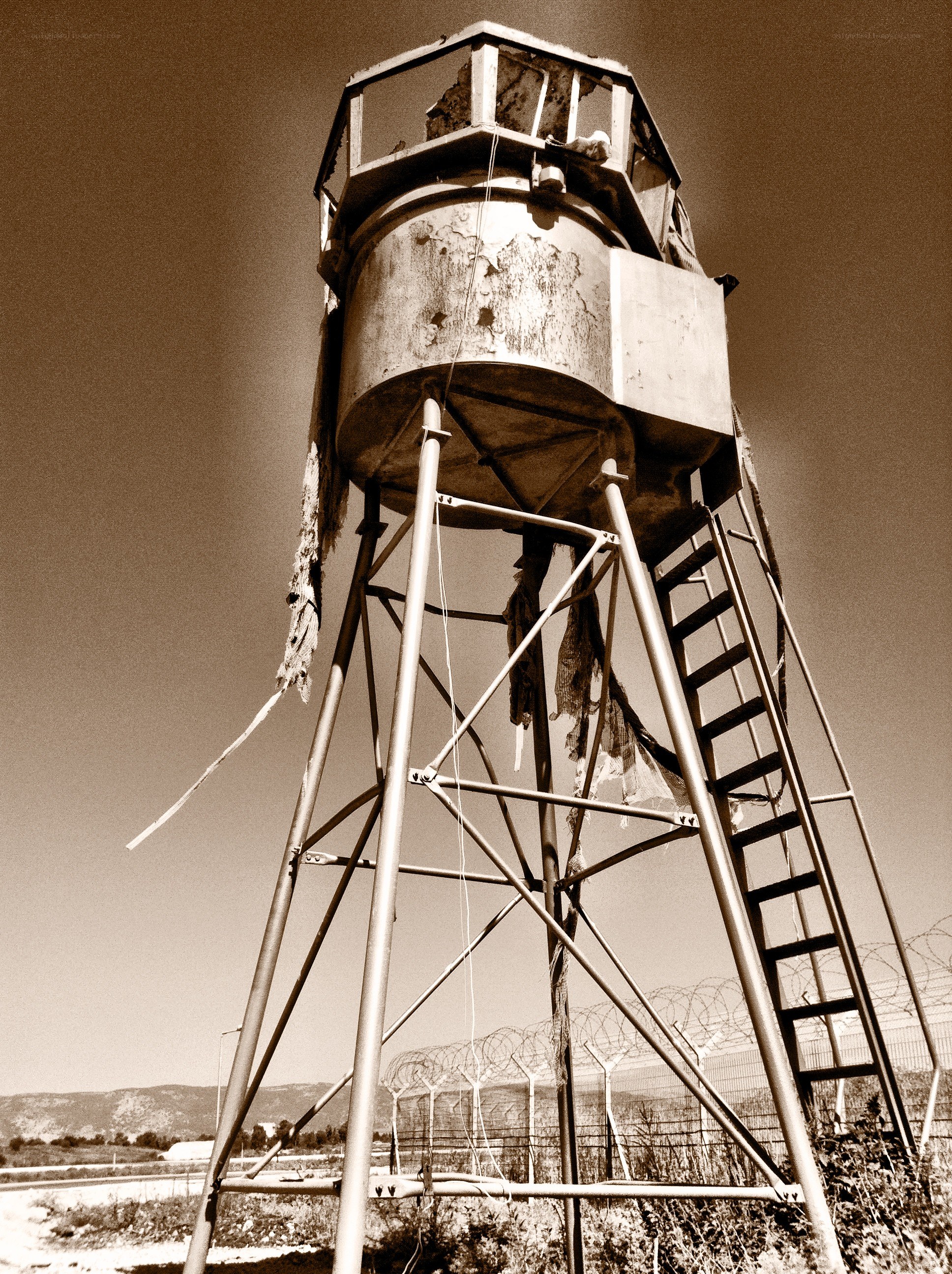 Abandoned watchtower in sepia