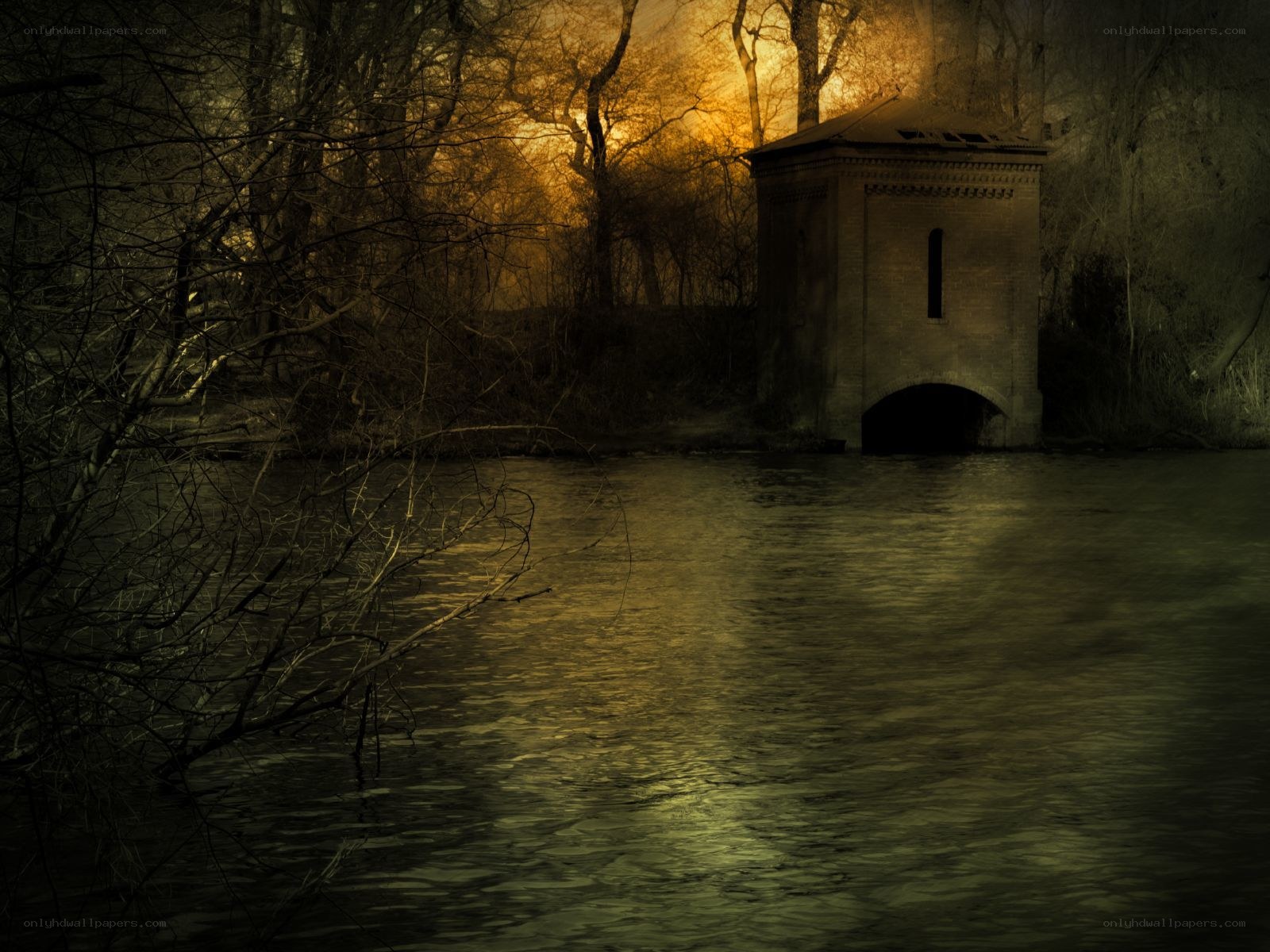 Abandoned water mill at dusk