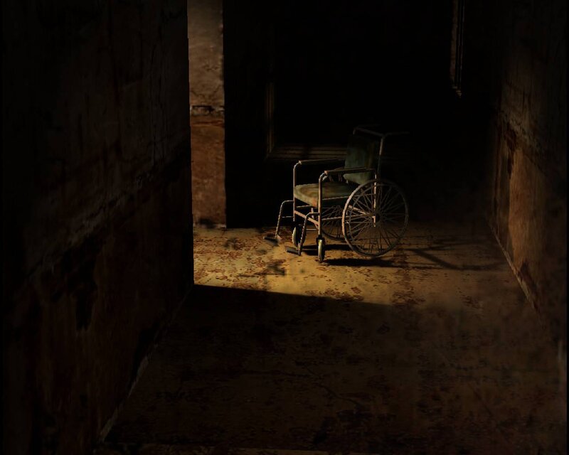 abandoned wheelchair in dark hallway