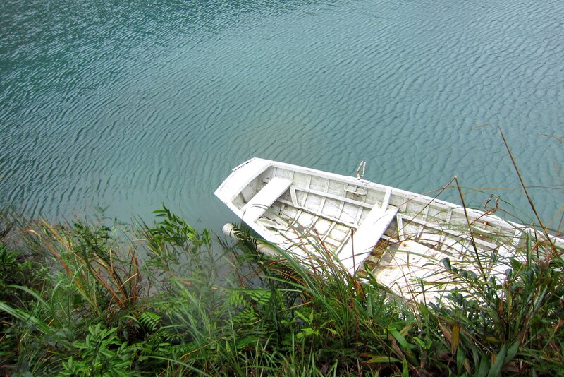 Abandoned White Boat