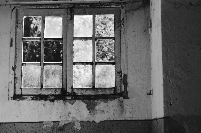 abandoned window in decay
