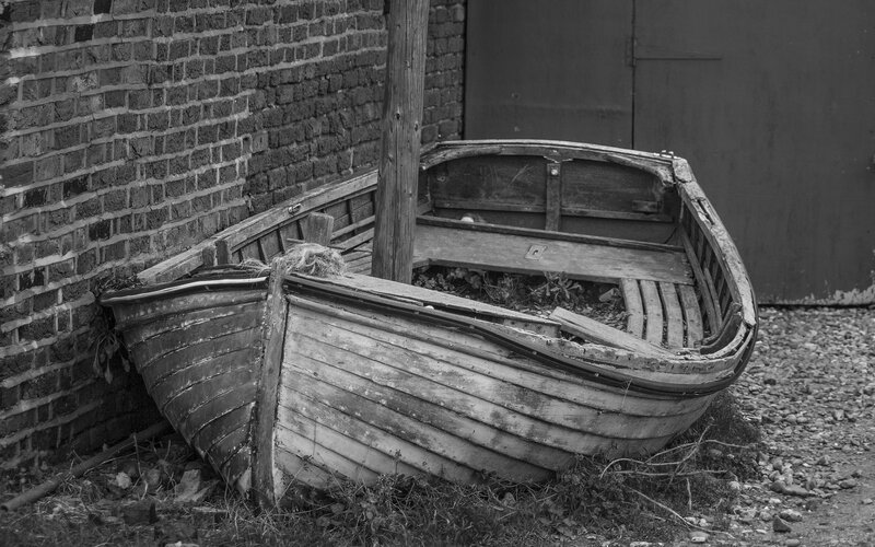 Abandoned Wooden Boat — Black, Desolate