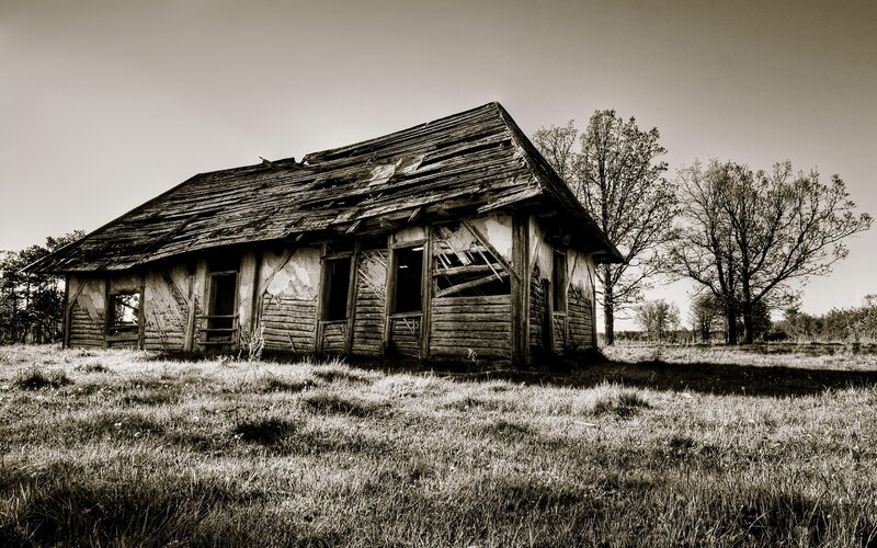 Abandoned Wooden Cabin — Black, Desolate, Photograph