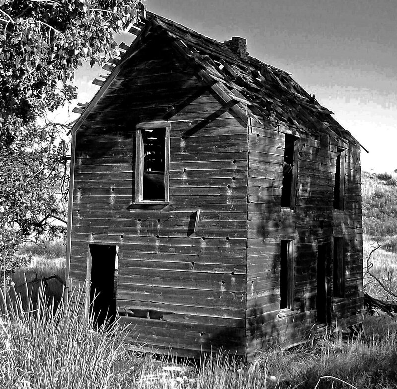 Abandoned Wooden House — Black, Desolate, Afternoon