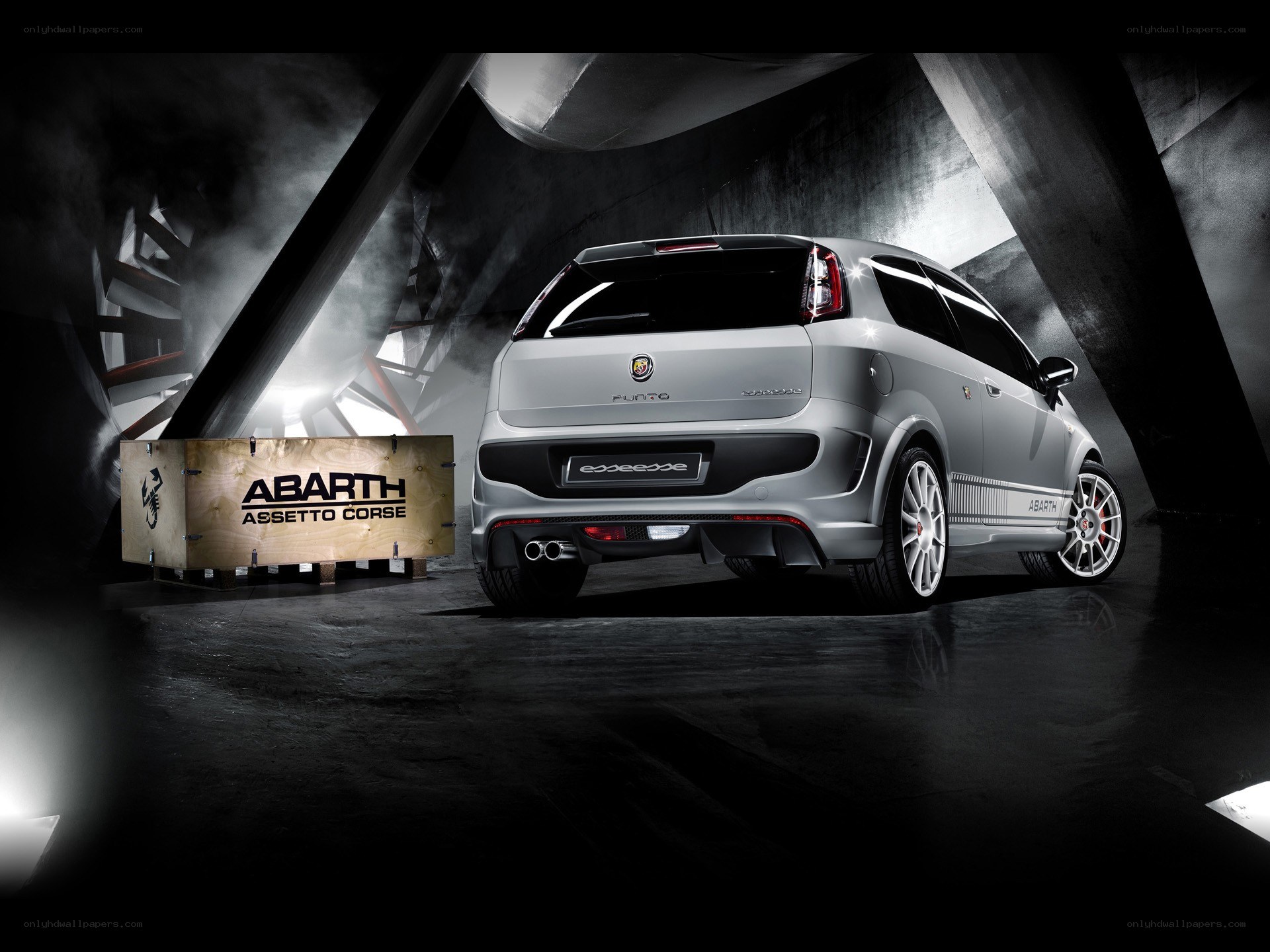 Abarth Punto in a dark studio