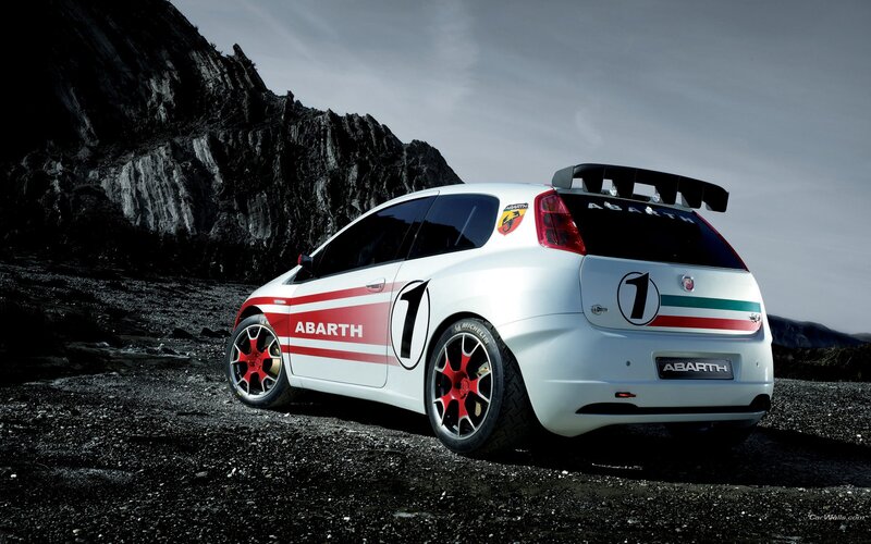 Abarth rally car on rocky terrain