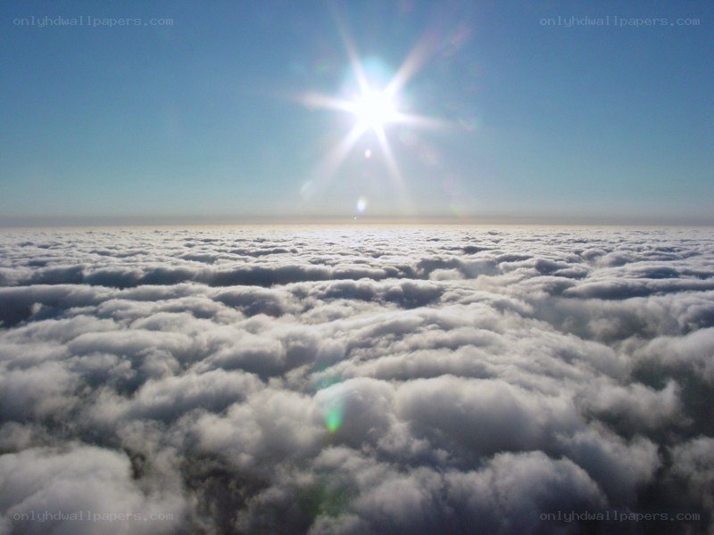 above the clouds at sunrise