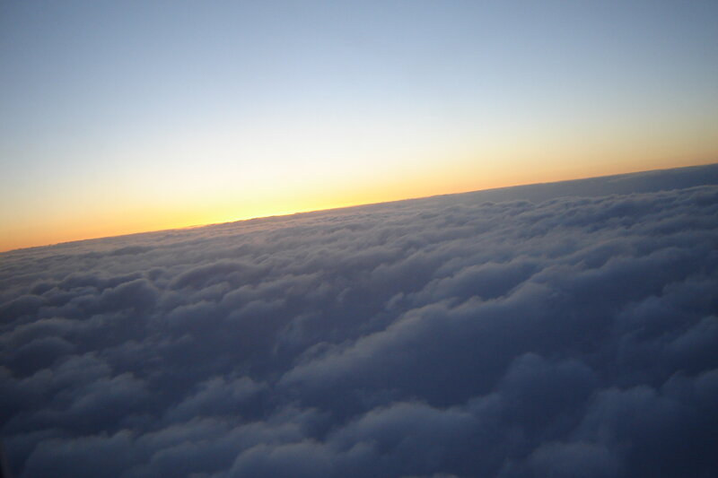 Above the clouds at sunset