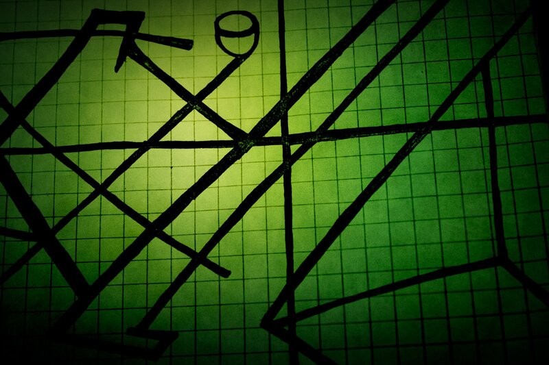 abstract black lines on green grid