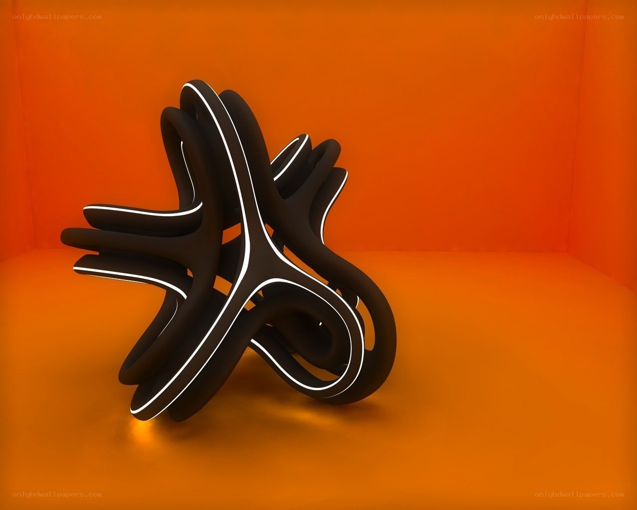 abstract black sculpture on orange