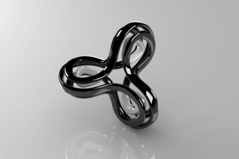 Abstract black sculpture on reflective surface