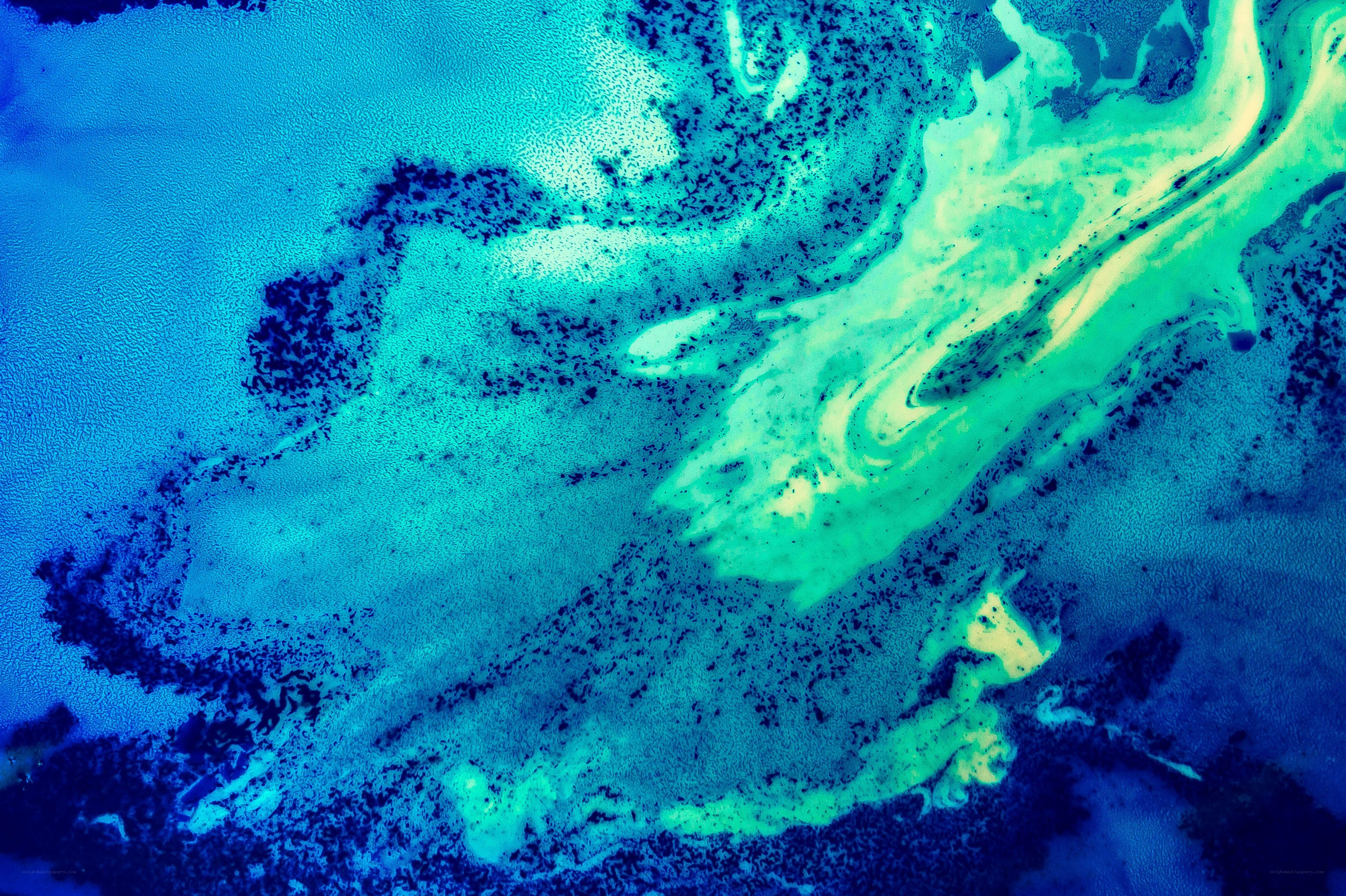 Abstract blue and green fluid patterns