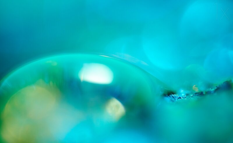 abstract blue-green liquid surface