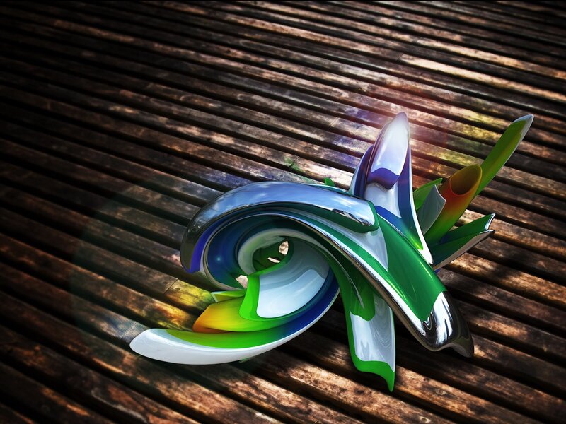 Abstract colorful sculpture on wood