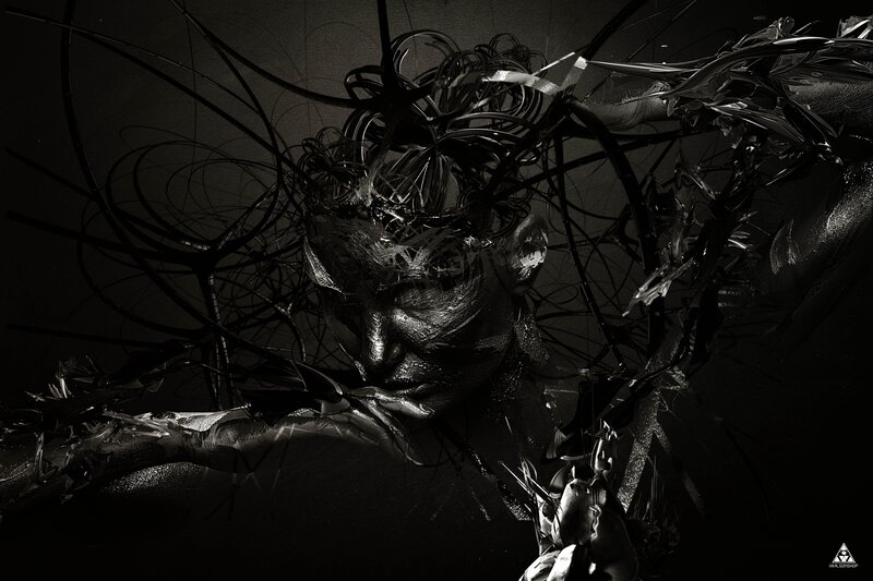abstract figure with dark tendrils