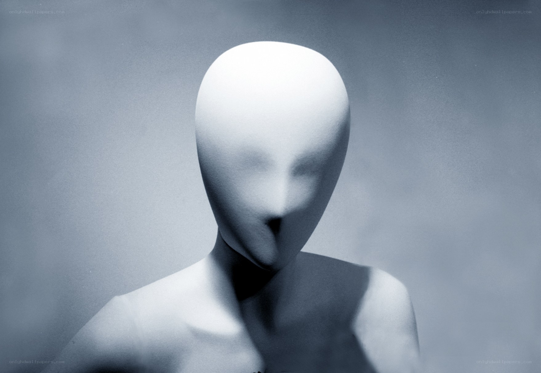 abstract figure with featureless face