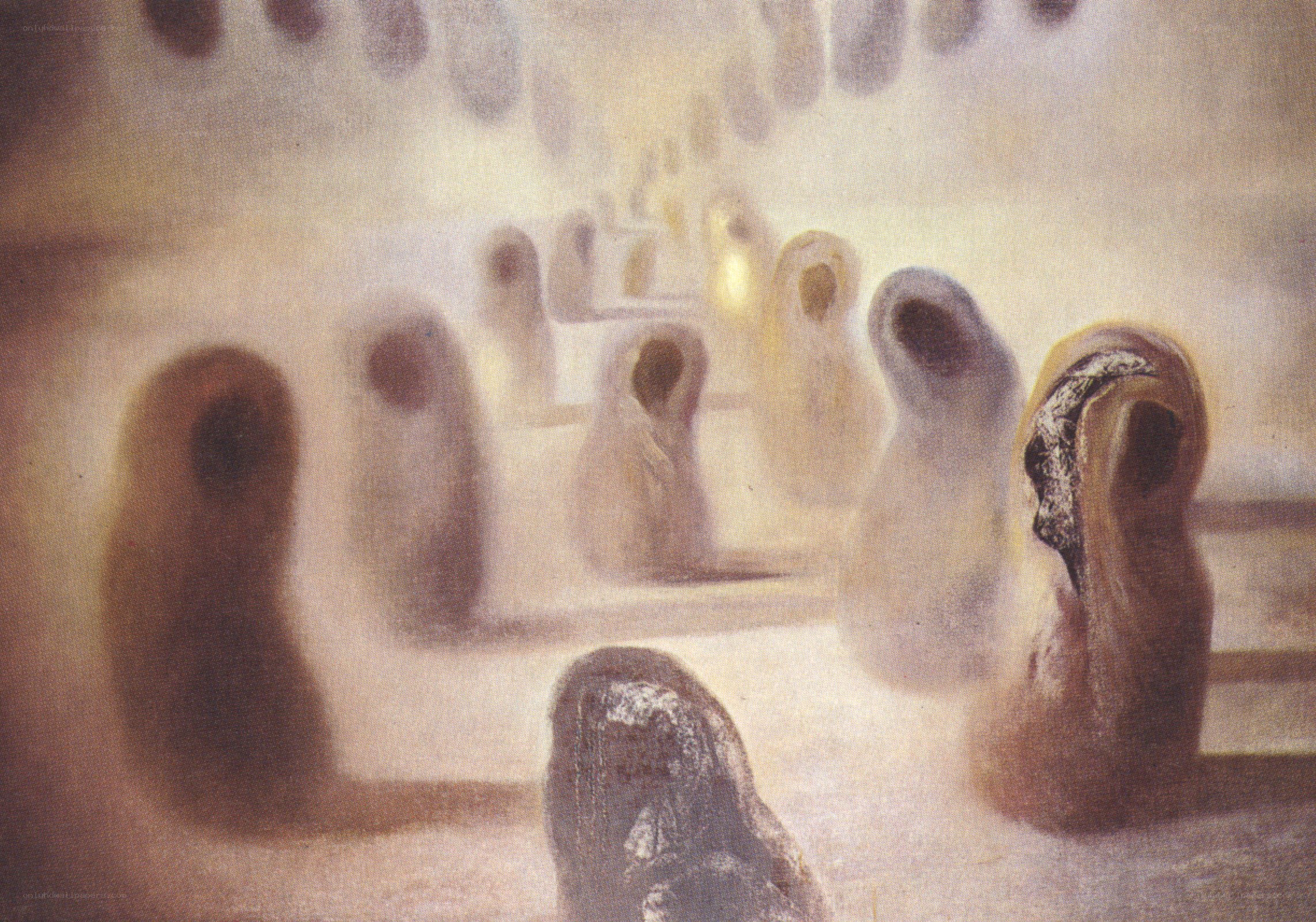Abstract figures in a misty hall