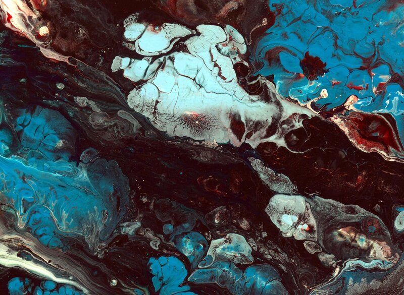 Abstract fluid art with blue and white swirls