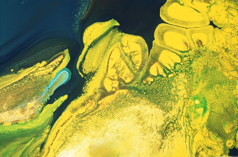 Abstract fluid art with yellow and blue