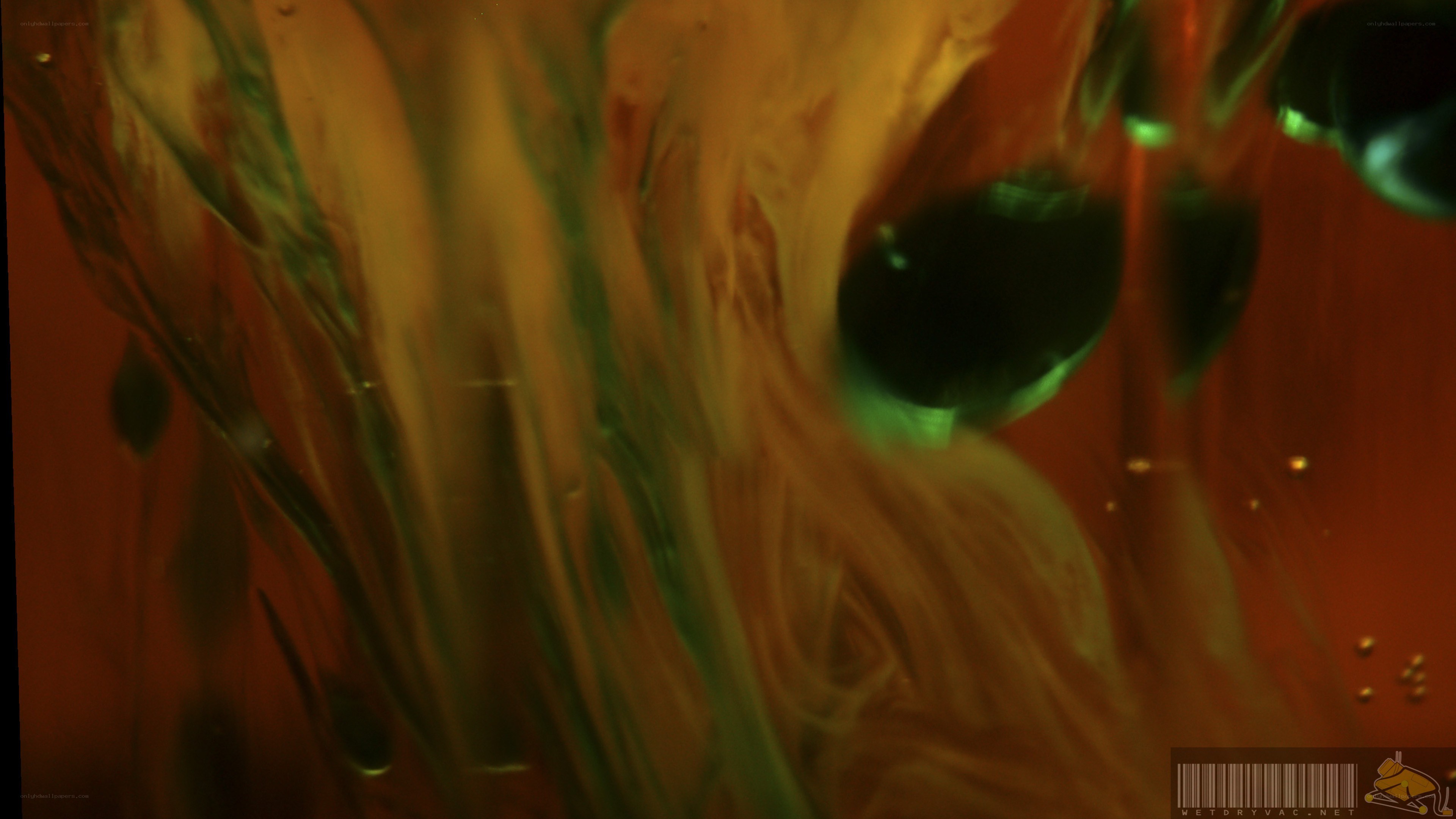 abstract fluid motion with green and orange