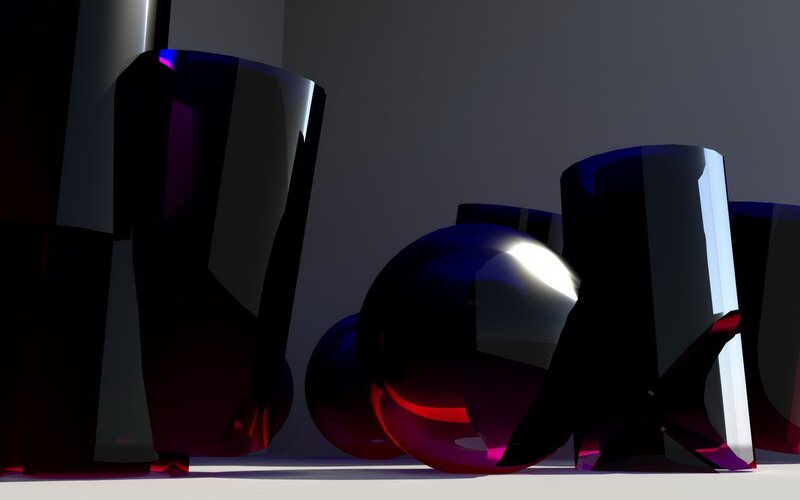 Abstract glass shapes in dark setting