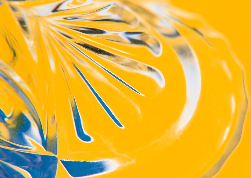 Abstract glass texture on yellow