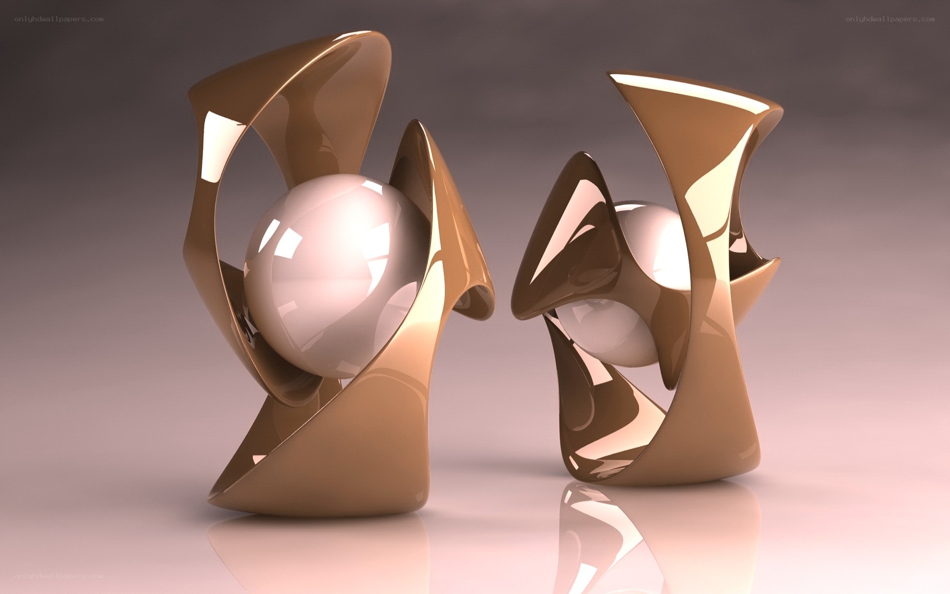 Abstract golden sculptures with spheres