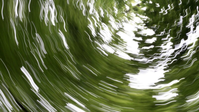 Abstract green and white light patterns