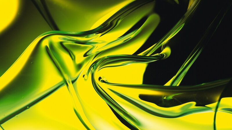 Abstract green and yellow liquid swirl