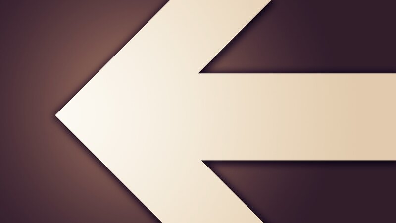 abstract left-pointing arrow
