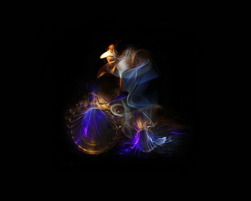 Abstract light painting of dancers