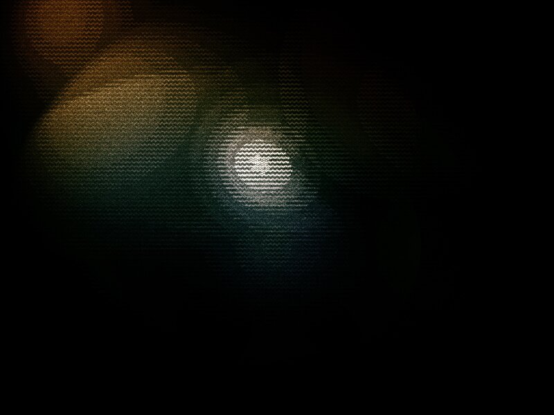abstract light pattern on dark background