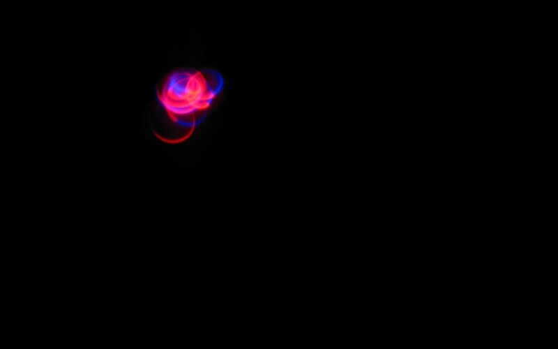 Abstract light patterns on black