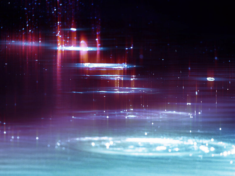Abstract light reflections on water