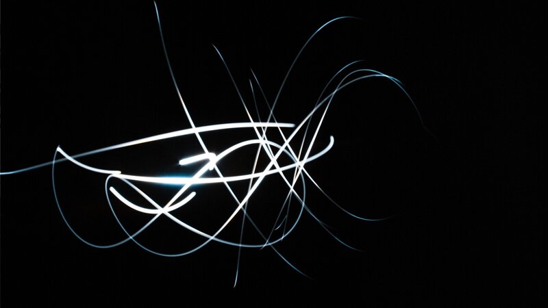 Abstract light trails on black