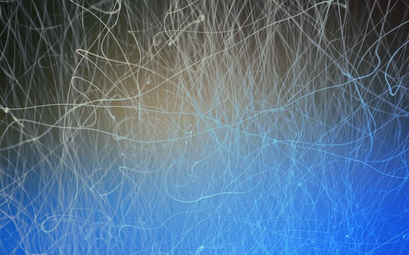 Abstract light trails on blue