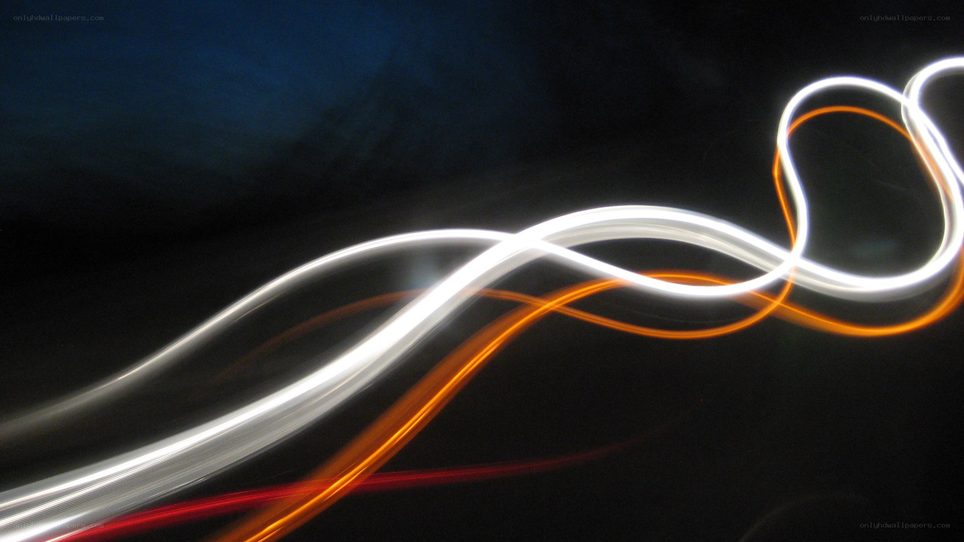 Abstract light trails on dark background